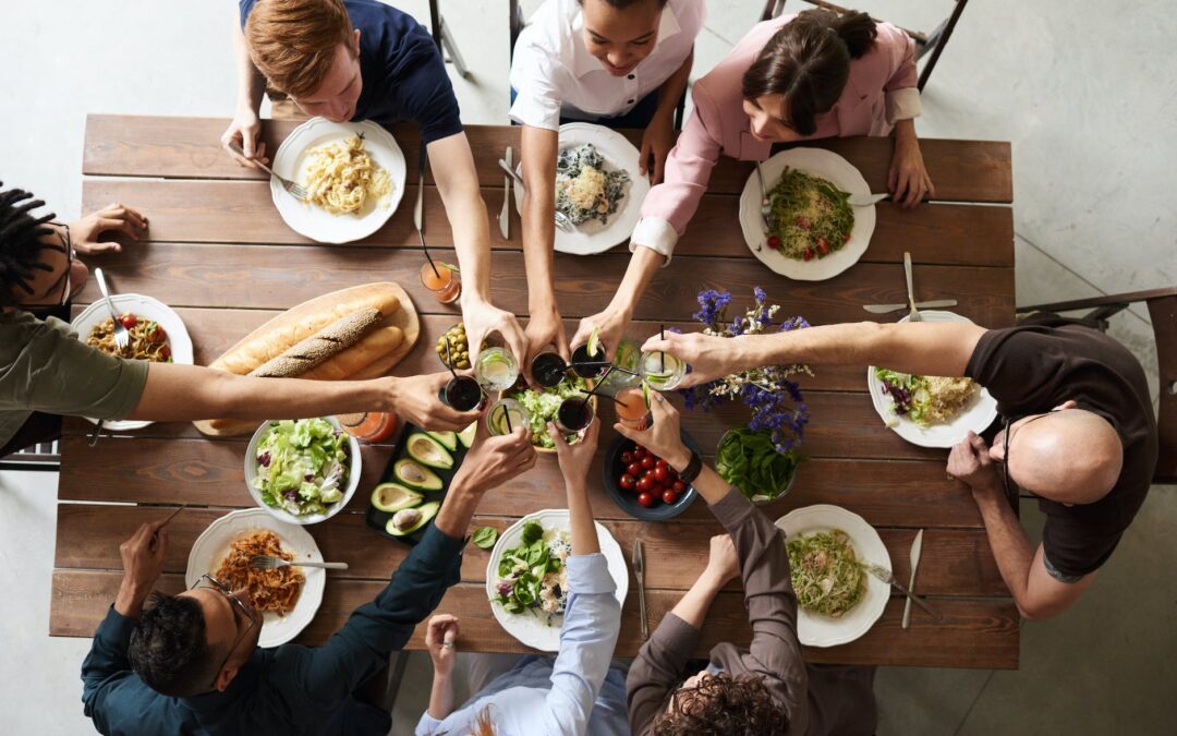 group of people making toast